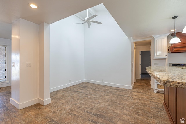 717 E Park Dr N, Hyrum, UT 84319 - unfurnished living room with a ceiling fan, lofted ceiling, baseboards, and hardwood / wood-style flooring