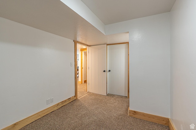 717 E Park Dr N, Hyrum, UT 84319 - carpeted empty room with baseboards