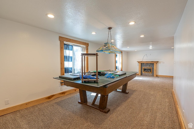 717 E Park Dr N, Hyrum, UT 84319 - rec room featuring a textured ceiling, recessed lighting, a fireplace, carpet flooring, and baseboards