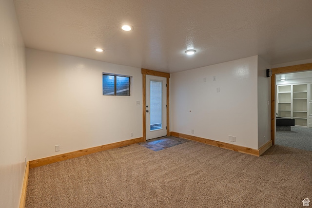 717 E Park Dr N, Hyrum, UT 84319 - spare room featuring recessed lighting, a textured ceiling, baseboards, and carpet floors