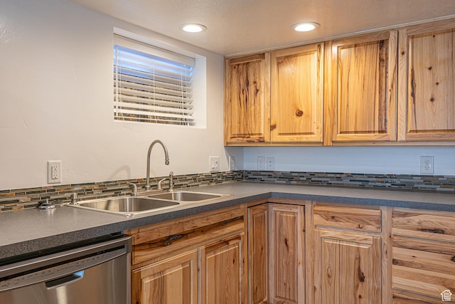 717 E Park Dr N, Hyrum, UT 84319 - kitchen featuring a sink, backsplash, dark countertops, and dishwasher
