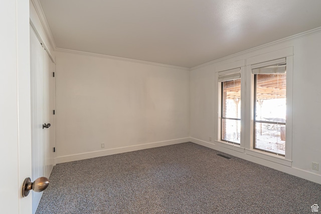 717 E Park Dr N, Hyrum, UT 84319 - carpeted empty room with visible vents, baseboards, and crown molding