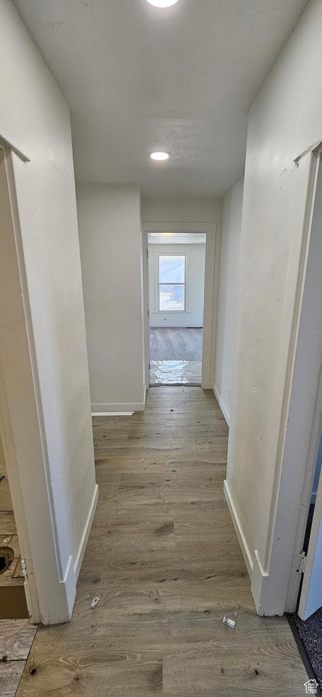 279 E 2nd St N, Downey, ID 83234 - corridor featuring wood finished floors and baseboards