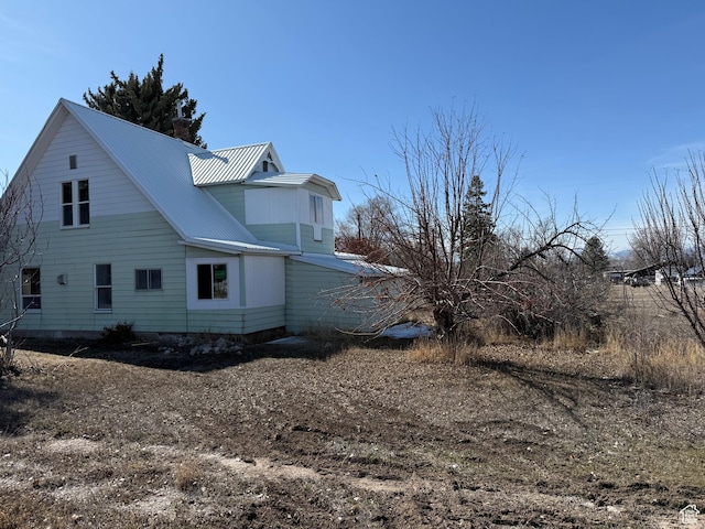 279 E 2nd St N, Downey, ID 83234 - view of side of property with metal roof