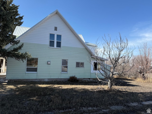 279 E 2nd St N, Downey, ID 83234 - view of property exterior featuring a yard and metal roof
