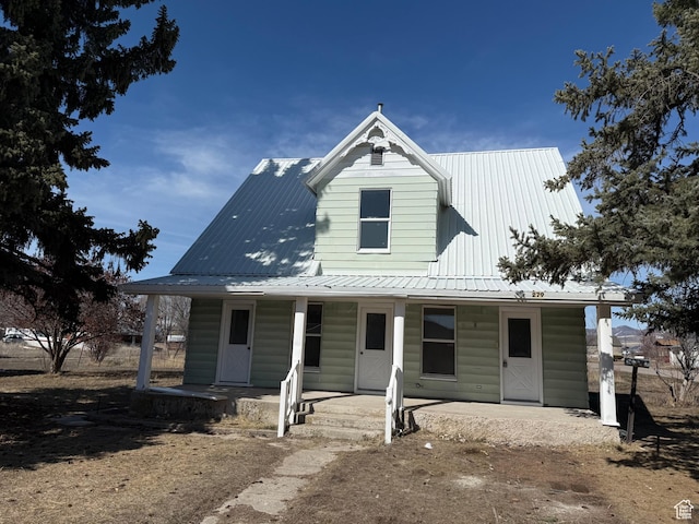 279 E 2nd St N, Downey, ID 83234 - view of front of house featuring a porch and metal roof