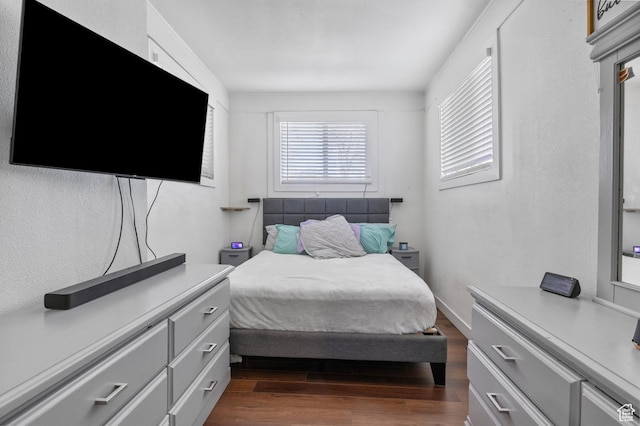 739 24th St, Ogden, UT 84401 - bedroom with dark wood-style flooring