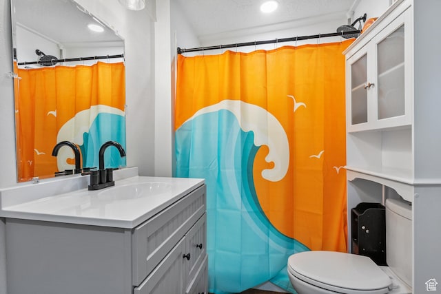 739 24th St, Ogden, UT 84401 - bathroom with recessed lighting, toilet, vanity, and a shower with curtain