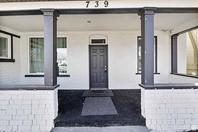 739 24th St, Ogden, UT 84401 - property entrance with a porch