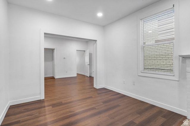 739 24th St, Ogden, UT 84401 - empty room featuring dark wood finished floors, recessed lighting, and baseboards