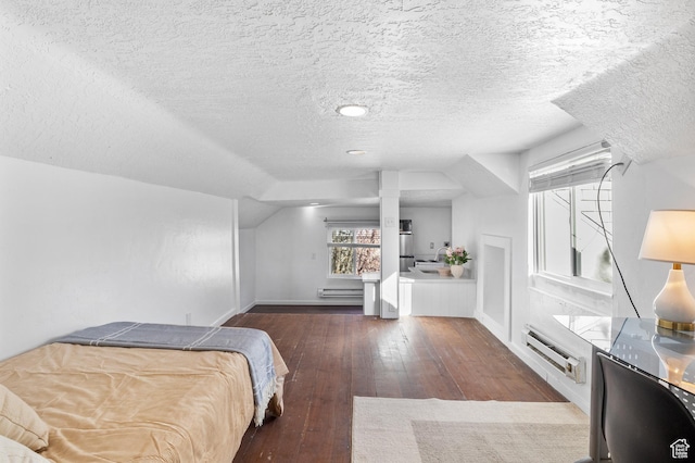 739 24th St, Ogden, UT 84401 - bedroom featuring vaulted ceiling, baseboards, wood-type flooring, and a textured ceiling