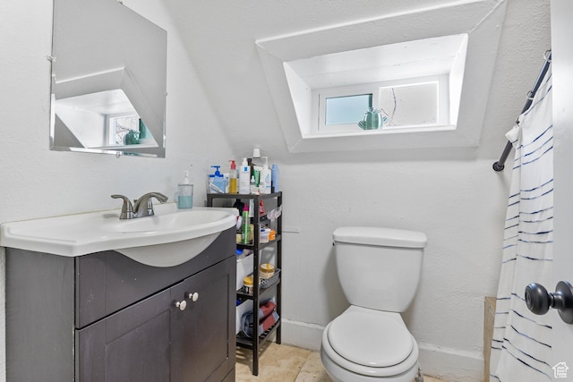 739 24th St, Ogden, UT 84401 - bathroom with baseboards, toilet, and vanity