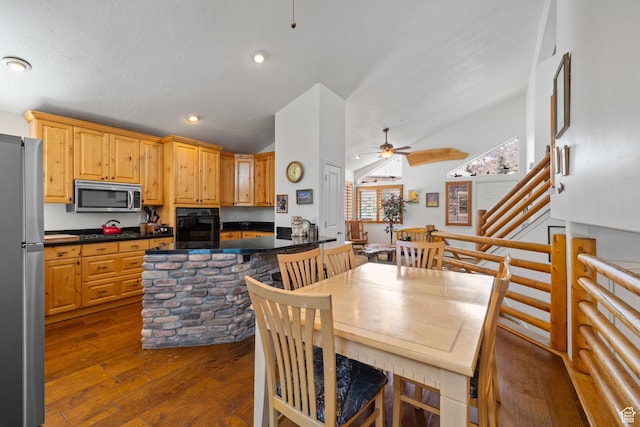 7494 Brook Hollow Loop Rd, Park City, UT 84098 - dining space featuring a ceiling fan, recessed lighting, stairs, vaulted ceiling, and dark wood-type flooring
