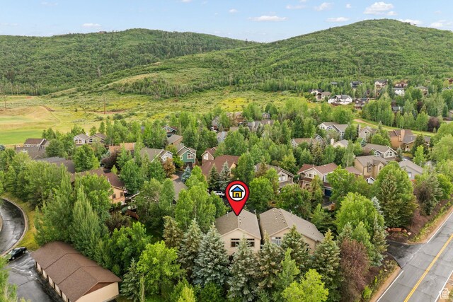 7494 Brook Hollow Loop Rd, Park City, UT 84098 - aerial view of residential area with a heavily wooded area and a mountain backdrop