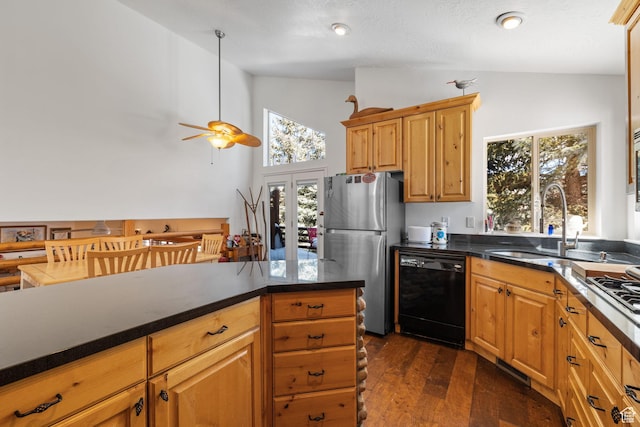 7494 Brook Hollow Loop Rd, Park City, UT 84098 - kitchen featuring dark wood-type flooring, a sink, black dishwasher, freestanding refrigerator, and vaulted ceiling