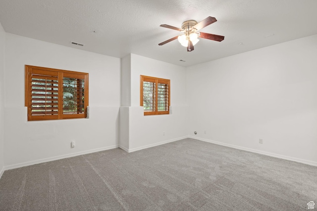 7494 Brook Hollow Loop Rd, Park City, UT 84098 - unfurnished room featuring ceiling fan, carpet flooring, and a textured ceiling