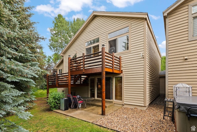 7494 Brook Hollow Loop Rd, Park City, UT 84098 - back of property with a wooden deck and a patio area