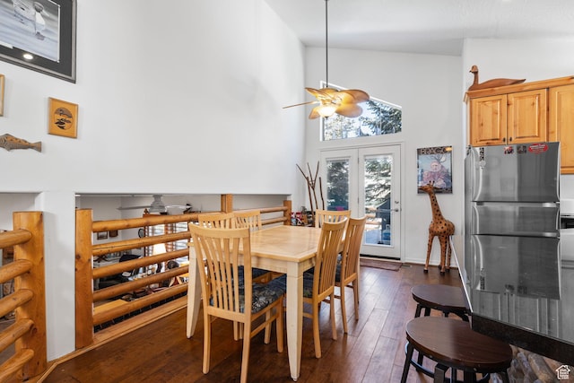 7494 Brook Hollow Loop Rd, Park City, UT 84098 - dining area featuring french doors, high vaulted ceiling, ceiling fan, and dark wood-style flooring
