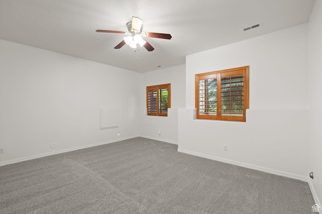 7494 Brook Hollow Loop Rd, Park City, UT 84098 - unfurnished room with a ceiling fan and dark carpet