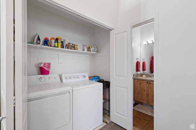 7494 Brook Hollow Loop Rd, Park City, UT 84098 - laundry room featuring a sink, laundry area, wood finished floors, and washing machine and clothes dryer