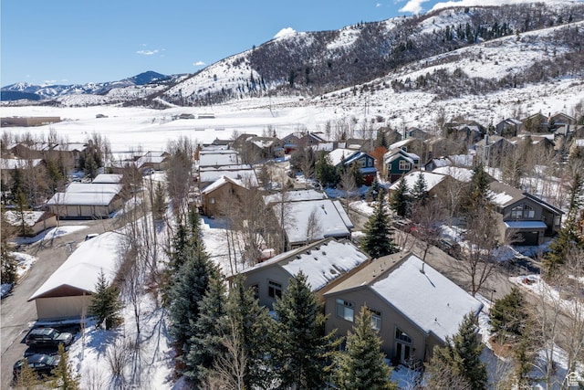 7494 Brook Hollow Loop Rd, Park City, UT 84098 - snowy aerial view featuring a mountain view and a residential view