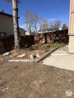 view of yard featuring fence