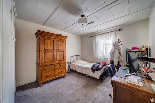 bedroom featuring visible vents and light carpet