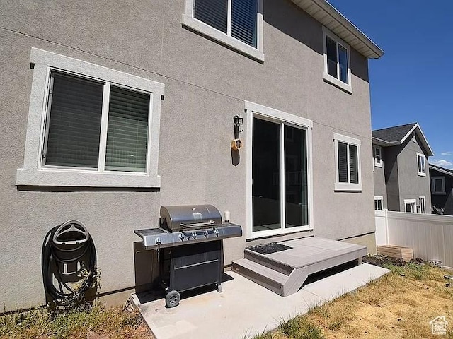 4929 W Red Ruby Ln, Herriman, UT 84096 - back of house with fence and stucco siding