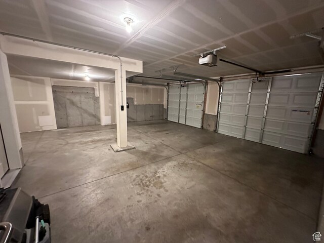 4929 W Red Ruby Ln, Herriman, UT 84096 - garage featuring a garage door opener