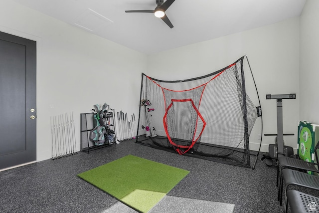exercise area featuring golf simulator and ceiling fan