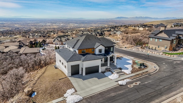birds eye view of property featuring a residential view and a mountain view