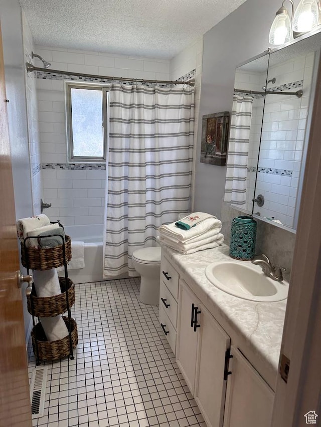 1653 S 500 E, Bountiful, UT 84010 - full bathroom with a textured ceiling, vanity, shower / bath combo, toilet, and tile patterned flooring