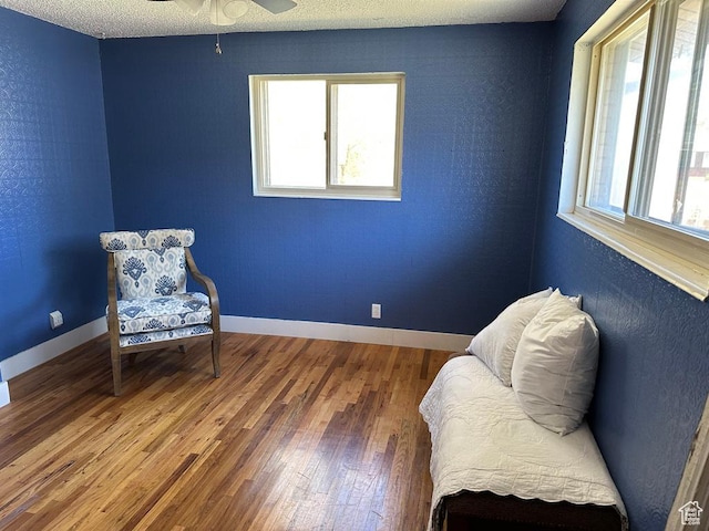 1653 S 500 E, Bountiful, UT 84010 - living area with wood finished floors, a ceiling fan, and baseboards