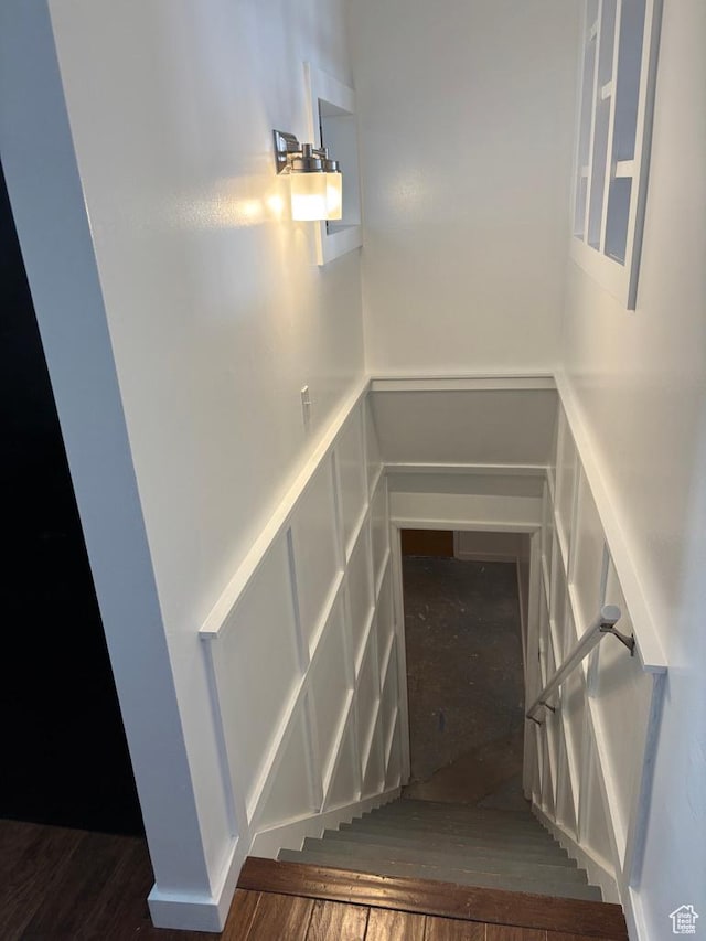 stairs with a decorative wall