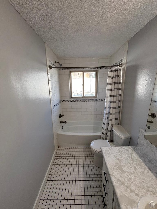 bathroom with toilet, vanity, tile patterned floors, a textured ceiling, and shower / bathtub combination with curtain