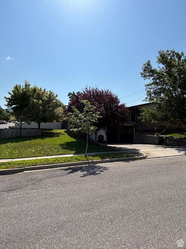 1653 S 500 E, Bountiful, UT 84010 - obstructed view of property with a front lawn and driveway