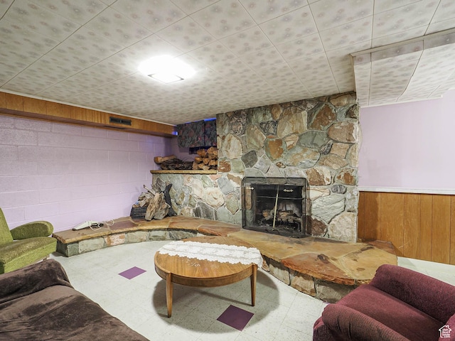 1325 E Milne Ln S, Cottonwood Heights, UT 84047 - living room featuring tile patterned floors, wainscoting, a fireplace, and wood walls