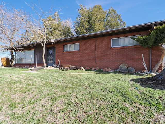 1325 E Milne Ln S, Cottonwood Heights, UT 84047 - view of front of house with a front lawn and brick siding