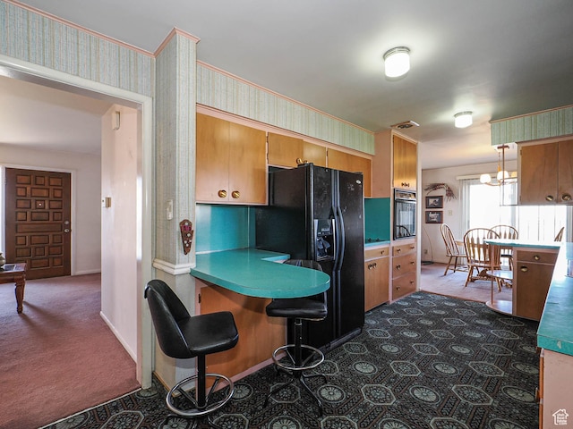 1325 E Milne Ln S, Cottonwood Heights, UT 84047 - kitchen with baseboards, carpet floors, wallpapered walls, oven, and black fridge
