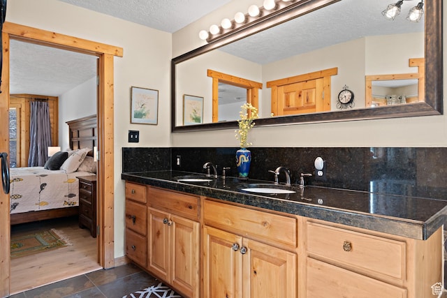 1762 S Hobblecreek Haven Rd, Springville, UT 84663 - ensuite bathroom featuring a textured ceiling and double vanity