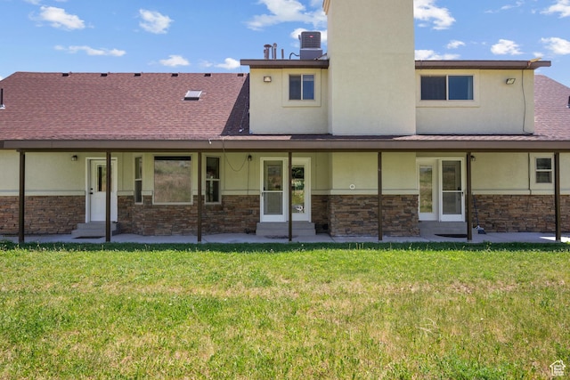 1762 S Hobblecreek Haven Rd, Springville, UT 84663 - rear view of property with stone siding, a yard, stucco siding, and roof with shingles