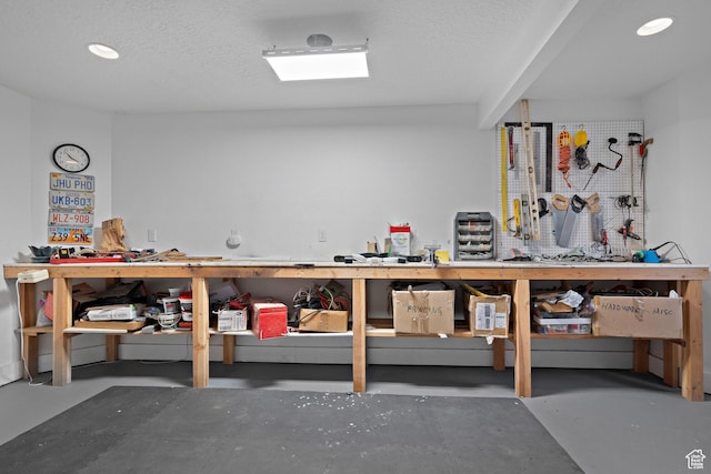 1762 S Hobblecreek Haven Rd, Springville, UT 84663 - misc room with a workshop area, concrete flooring, and a textured ceiling