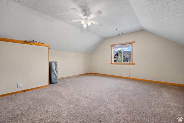 1762 S Hobblecreek Haven Rd, Springville, UT 84663 - additional living space with a textured ceiling, carpet flooring, lofted ceiling, and a ceiling fan