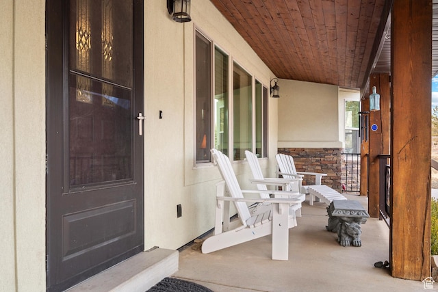 1762 S Hobblecreek Haven Rd, Springville, UT 84663 - view of exterior entry featuring a porch, stucco siding, and stone siding