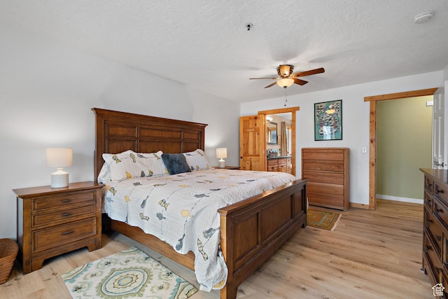 1762 S Hobblecreek Haven Rd, Springville, UT 84663 - bedroom featuring light wood-style floors, ceiling fan, and a textured ceiling
