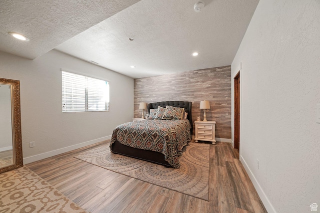 13862 S 7300 W, Herriman, UT 84096 - bedroom with a textured ceiling, wood finished floors, and recessed lighting