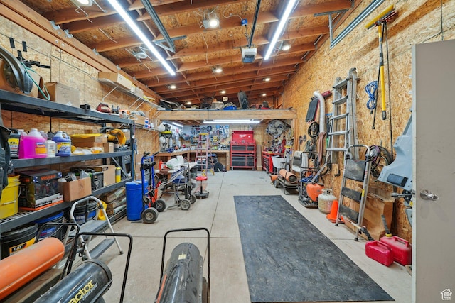 13862 S 7300 W, Herriman, UT 84096 - garage featuring a workshop area and a garage door opener