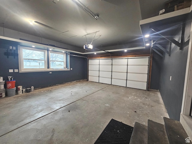 garage featuring a garage door opener