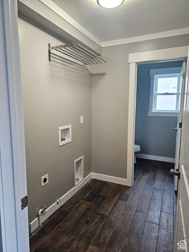 laundry area with dark wood-style flooring, electric dryer hookup, hookup for a washing machine, and hookup for a gas dryer