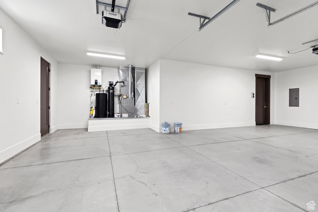 810 E 150 S, Enterprise, UT 84725 - garage with heating unit, electric panel, a garage door opener, and baseboards